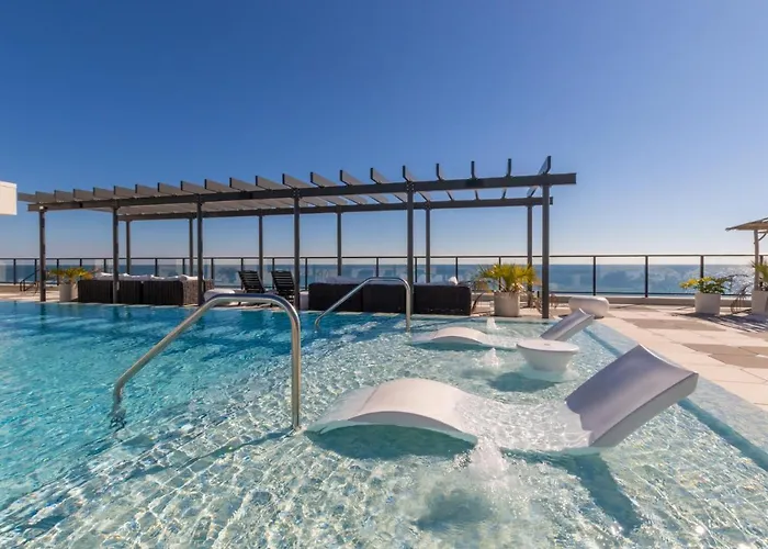 Holiday home Elegant 4 Bedroom Beachfront, Luxury With Rooftop Pool Next To The Hangout